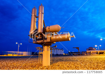 Hydropneumatic drive of underground valve on gas pipeline at dusk Hydropneumatic drive of underground valve on gas pipeline at dusk 117758085