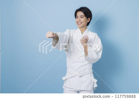 A man practicing karate 117759888