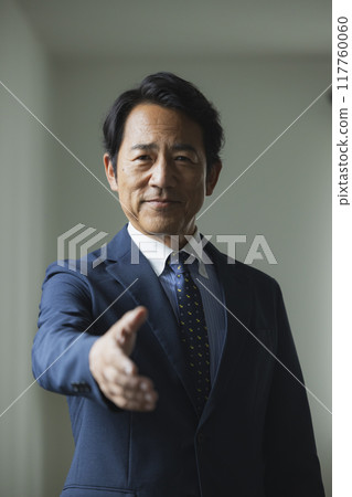 Portrait of a middle-aged man in a suit 117760060