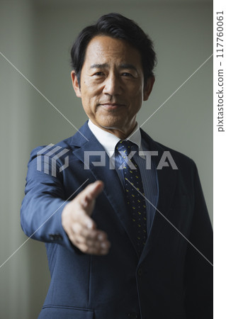 Portrait of a middle-aged man in a suit Portrait of a middle-aged man in a suit 117760061
