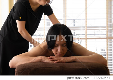 Men's beauty salon body care treatment 117760357