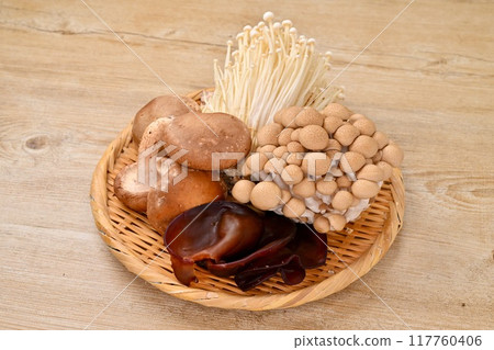 Mushroom food images: shiitake, shimeji, enoki, and wood ear. 117760406