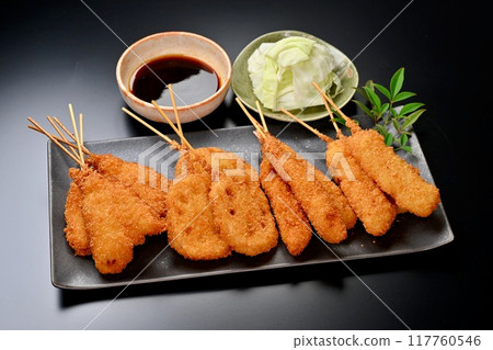 Kushikatsu, skewered fried food, local cuisine, Osaka, whiting, lotus root, shrimp, squid, sauce Kushikatsu, skewered fried food, local cuisine, Osaka, whiting, lotus root, shrimp, squid, sauce 117760546