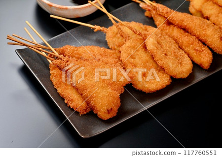 Kushikatsu, skewered fried food, local cuisine, Osaka, whiting, lotus root, shrimp, squid, sauce 117760551