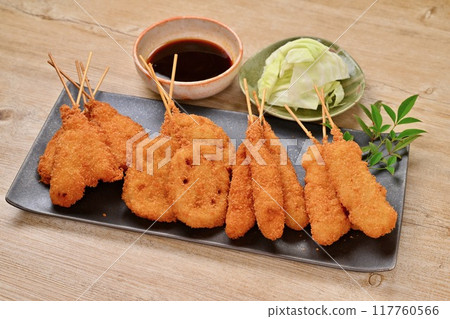 Kushikatsu, skewered fried food, local cuisine, Osaka, whiting, lotus root, shrimp, squid, sauce Kushikatsu, skewered fried food, local cuisine, Osaka, whiting, lotus root, shrimp, squid, sauce 117760566