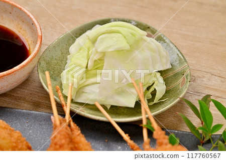 Kushikatsu, skewered fried food, local cuisine, Osaka, whiting, lotus root, shrimp, squid, sauce Kushikatsu, skewered fried food, local cuisine, Osaka, whiting, lotus root, shrimp, squid, sauce 117760567