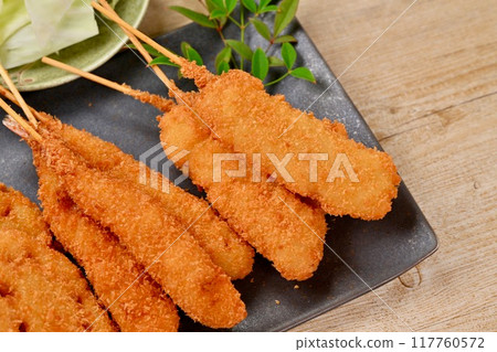Kushikatsu, skewered fried food, local cuisine, Osaka, whiting, lotus root, shrimp, squid, sauce 117760572