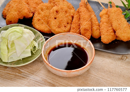 Kushikatsu, skewered fried food, local cuisine, Osaka, whiting, lotus root, shrimp, squid, sauce 117760577