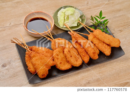 Kushikatsu, skewered fried food, local cuisine, Osaka, whiting, lotus root, shrimp, squid, sauce 117760578