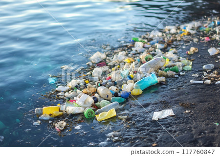 Plastic bottles dumped in the ocean 117760847