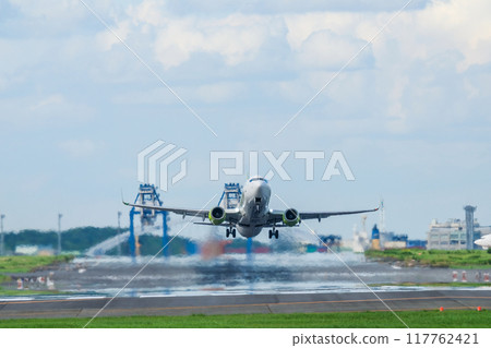 Airplane taking off from the airport 117762421