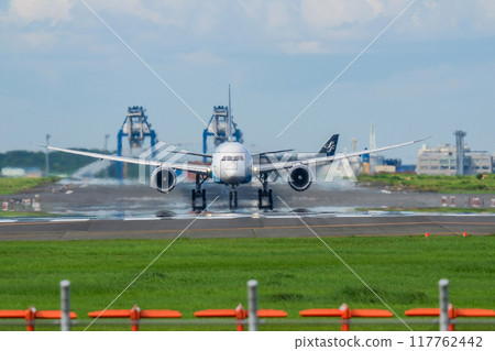 Airplane taking off from the airport 117762442