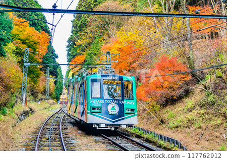 Tokyo: A cable car climbing Mt. Mitake in autumn colors 117762912