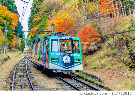 Tokyo: A cable car climbing Mt. Mitake in autumn colors 117762913