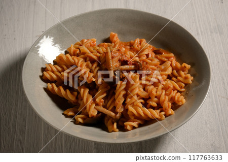 Fusilli tomato sauce pasta Fusilli tomato sauce pasta 117763633