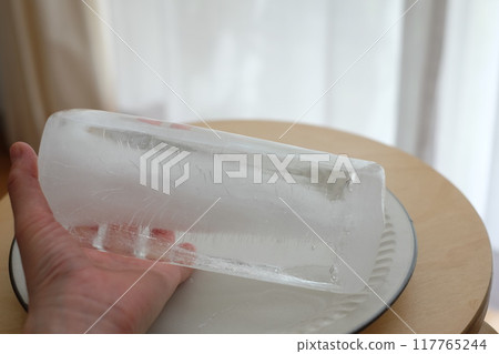 Block ice made from milk cartons Block ice made from milk cartons 117765244