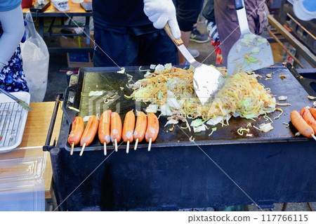 Cooking scene at a festival stall 2 Cooking scene at a festival stall 2 117766115