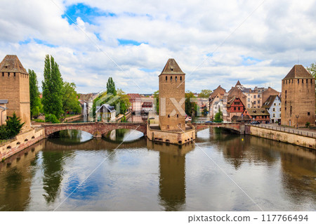 View on medieval bridge Ponts Couverts over the River Ill in Strasbourg, Alsace, France View on medieval bridge Ponts Couverts over the River Ill in Strasbourg, Alsace, France 117766494