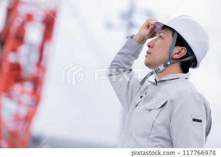 Workers working at a construction site Workers working at a construction site 117766978
