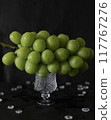 Delicious juicy Shine Muscat grapes on a glass plate 117767276
