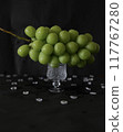 Delicious juicy Shine Muscat grapes on a glass plate 117767280