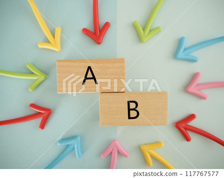 The letters A and B surrounded by colorful arrows, compare and arrange 117767577