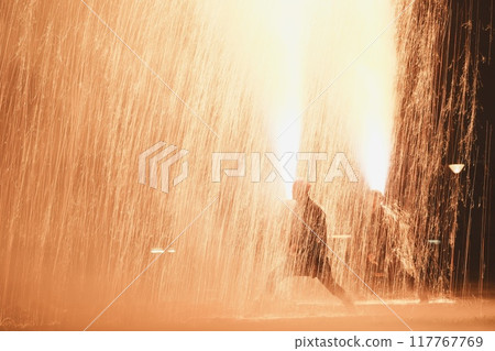 Hand-held fireworks showering with fantastic light 117767769