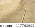 road track on sand 117768933