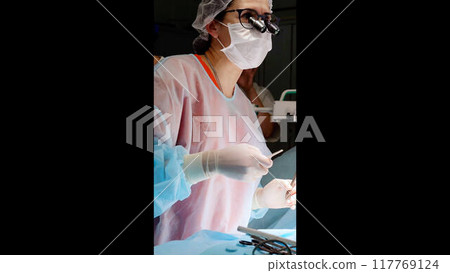 Modern hospital surgical procedure precision attention to patient modern medicine technologies skilled professionals. Operating room courage expertise collaborative efforts of surgeons nurses. Modern hospital surgical procedure precision attention to patient modern medicine technologies skilled professionals. Operating room courage expertise collaborative efforts of surgeons nurses. 117769124