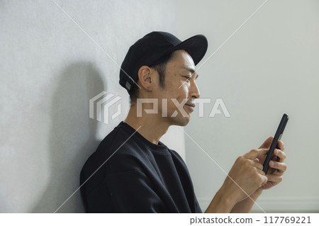 Man in cap 117769221