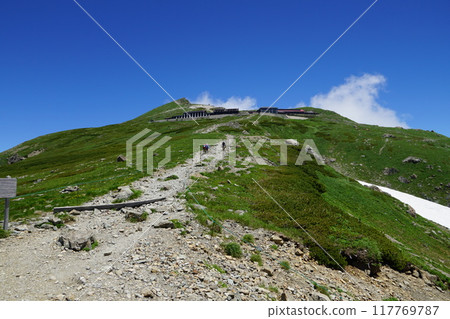 Hakuba Mountain Lodge seen from the Sobodani junction on the hiking trail to Mt. Hakuba 117769787