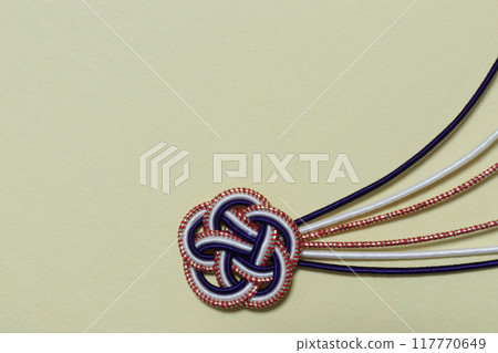 Mizuhiki placed on a yellow background Mizuhiki placed on a yellow background 117770649