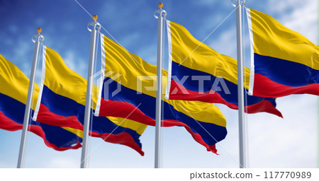 Colombia national flags waving in the wind on a clear day Colombia national flags waving in the wind on a clear day 117770989
