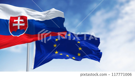 Close-up of Slovakia and the European Union flags waving on a clear day 117771006