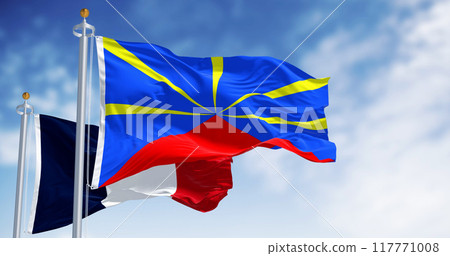 Reunion and national french flags waving in the wind on a clear day 117771008