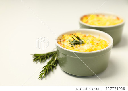 Concept of tasty and delicious homemade food - potato casserole Concept of tasty and delicious homemade food - potato casserole 117771038