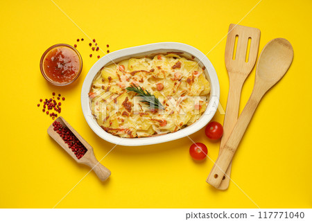 Concept of tasty and delicious homemade food - potato casserole Concept of tasty and delicious homemade food - potato casserole 117771040