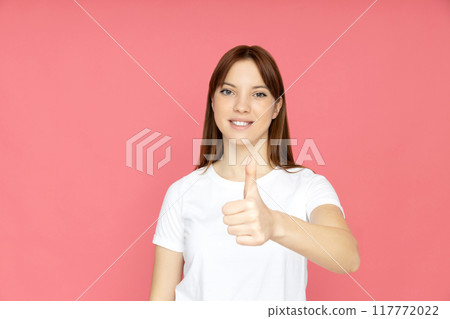 An attractive young girl on a plain background 117772022