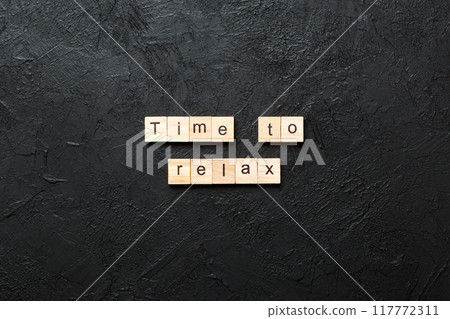 time to relax word written on wood block. time to relax text on table, concept 117772311