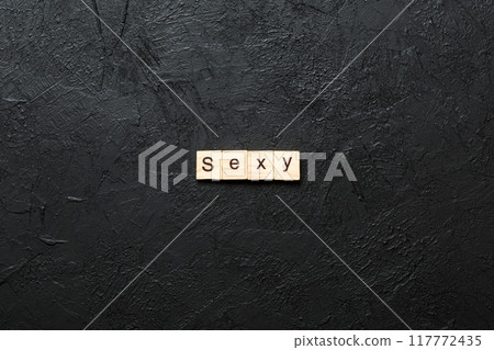 sexy word written on wood block. sexy text on table, concept sexy word written on wood block. sexy text on table, concept 117772435