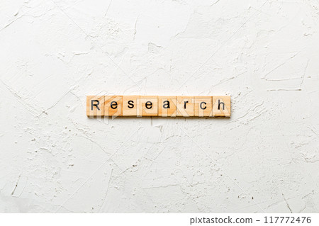 research word written on wood block. research text on table, concept 117772476