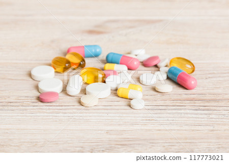 Collection Of Various Medical Tablets And Pills. Assorted pharmaceutical medicine pills, tablets and capsules on table background. Heap of assorted various medicine tablets. Health care Collection Of Various Medical Tablets And Pills. Assorted pharmaceutical medicine pills, tablets and capsules on table background. Heap of assorted various medicine tablets. Health care 117773021