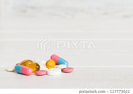 Collection Of Various Medical Tablets And Pills. Assorted pharmaceutical medicine pills, tablets and capsules on table background. Heap of assorted various medicine tablets. Health care Collection Of Various Medical Tablets And Pills. Assorted pharmaceutical medicine pills, tablets and capsules on table background. Heap of assorted various medicine tablets. Health care 117773022