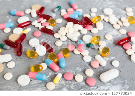 Collection Of Various Medical Tablets And Pills. Assorted pharmaceutical medicine pills, tablets and capsules on table background. Heap of assorted various medicine tablets. Health care Collection Of Various Medical Tablets And Pills. Assorted pharmaceutical medicine pills, tablets and capsules on table background. Heap of assorted various medicine tablets. Health care 117773024