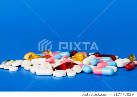 Many different colorful medication and pills perspective view. Set of many pills on colored background Many different colorful medication and pills perspective view. Set of many pills on colored background 117773029