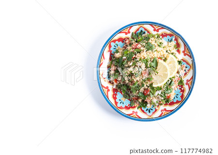 Tabbouleh salad with couscous and vegetables isolated on white background 117774982