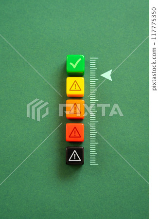 Acceptable level. Scale with warnings. Security. On the verge of moving from green to yellow alert level. Safety system. 117775350