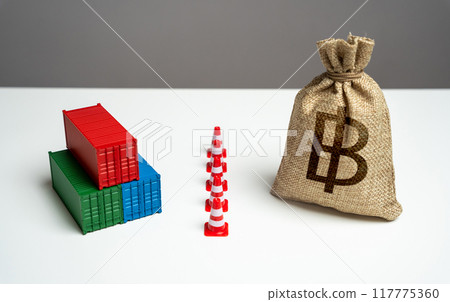 Shipping containers with goods and thai baht money bag are separated by a barrier. Naval blockade. Logistics difficulties. Economic sanctions. Break a trade deal. 117775360