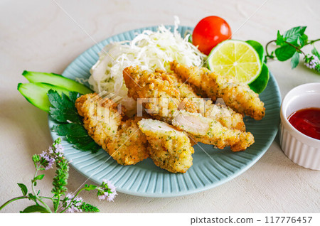Chicken fillet sticks with green laver 117776457