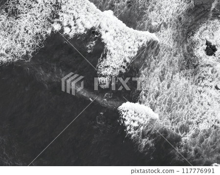 Aerial view of white waves at Sonogi Beach 117776991